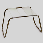 A light gray background, highlighting the support Stool's sturdy heavy-duty tubular steel frame, high-strength TPU seat, that holds up to 300 pounds. 