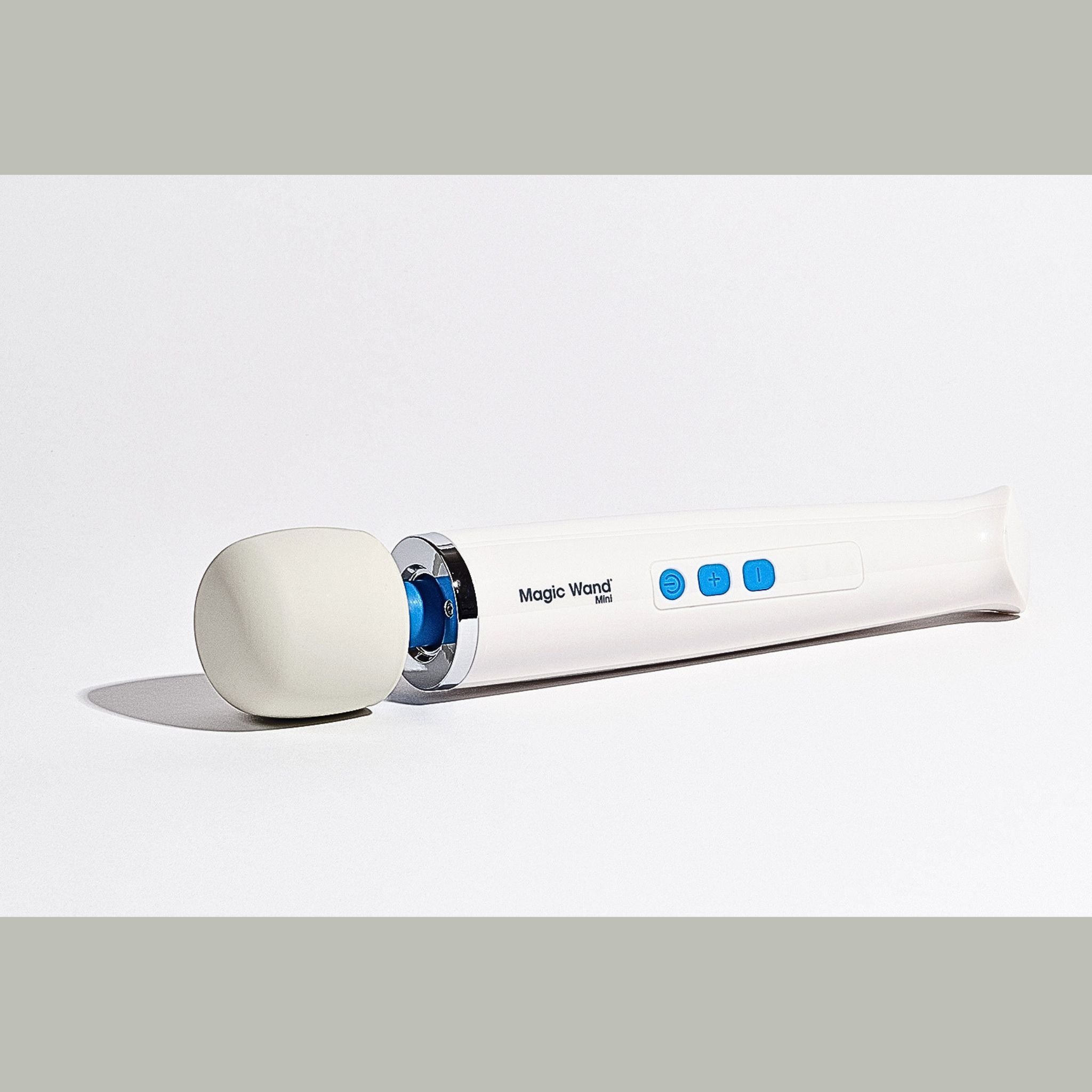 A white Magic Wand Mini on a white background. Highlighting the low dexterity adaptive design for arthritis-friendly luxury intimacy.