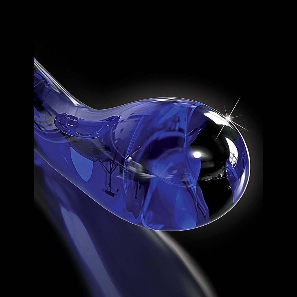Adaptive glass wand for anorectal sensory support showing smooth curved tip on black background.