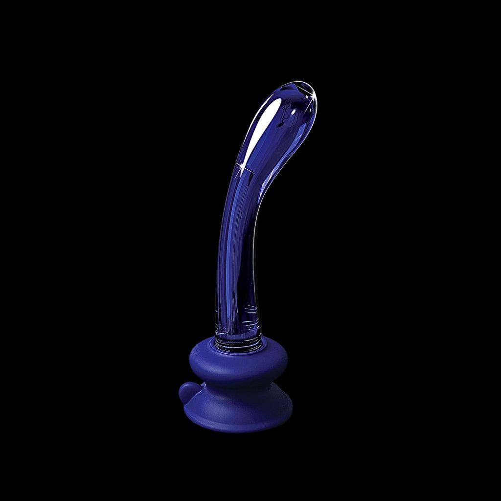 Adaptive glass wand with secure suction base for limited mobility wellness on a black background.