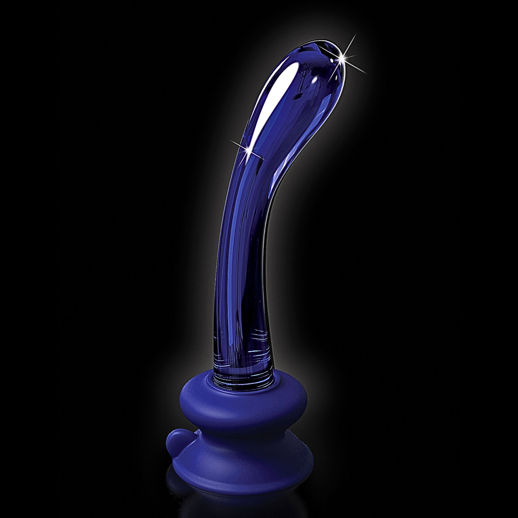 Adaptive glass wand with secure suction base for limited mobility wellness on a black background.