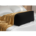 Adaptive intimacy positioning wedge in matte charcoal with gold drape for ergonomic wellness.