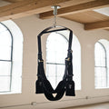 Adaptive mobility suspension swing in a sunlit loft sanctuary for joint pressure relief. suspension swing in a sunlit loft sanctuary for joint pressure relief. 
