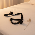 Adaptive positioning straps in black providing ergonomic wellness for limited mobility.