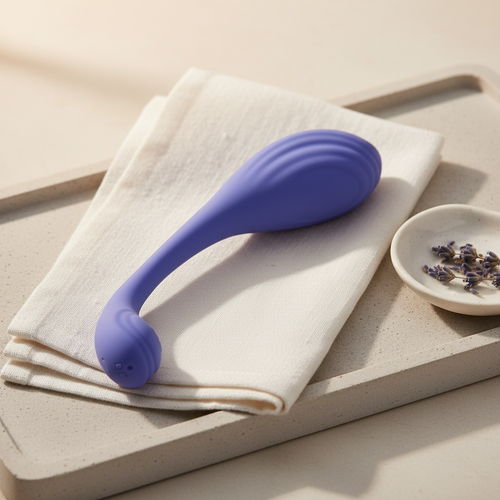 App-controlled kegel trainer in periwinkle centered for discreet pelvic floor wellness.