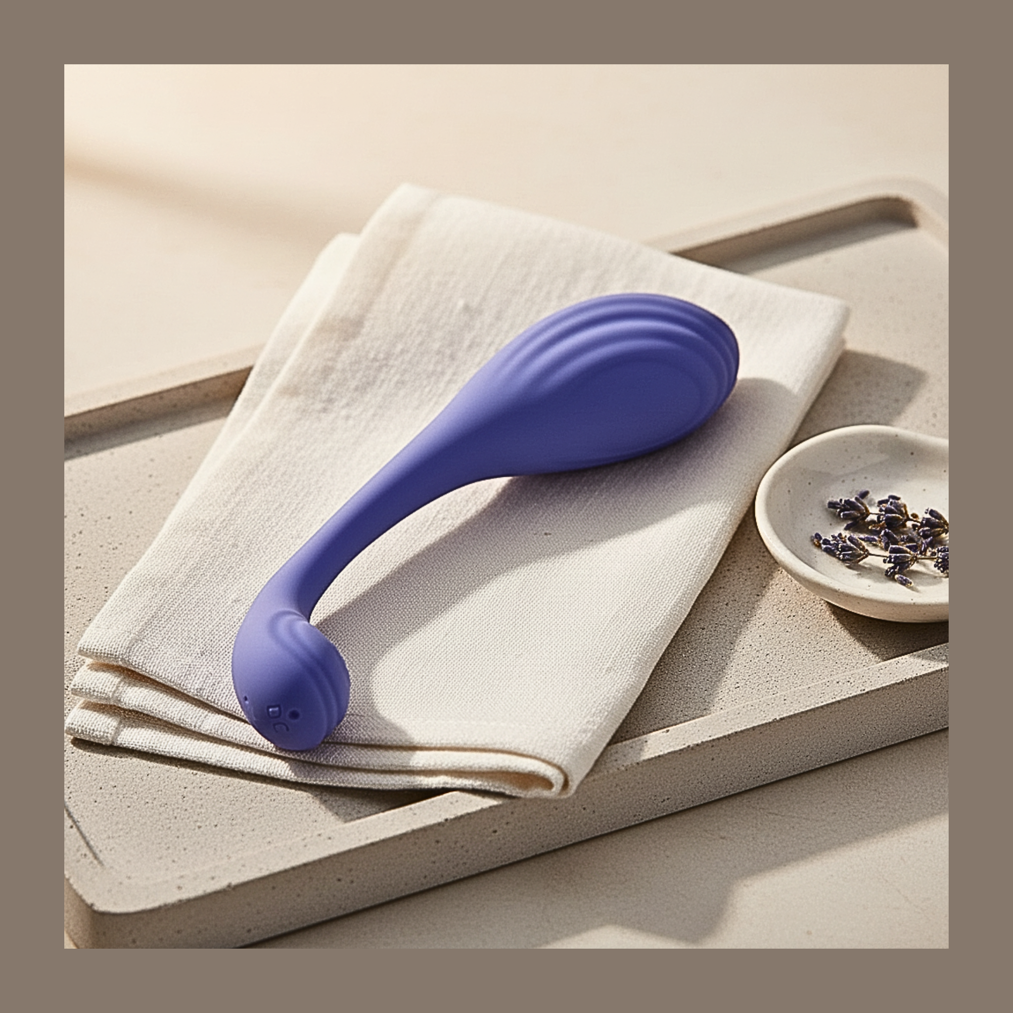 App-controlled kegel trainer in periwinkle centered for discreet pelvic floor wellness.