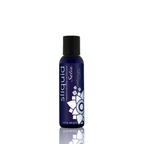 Botanical intimate glide travel size bottle supporting gentle pelvic floor wellness.