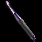 Glowing purple glass wand attachment for ambient light therapy and tactile feedback.