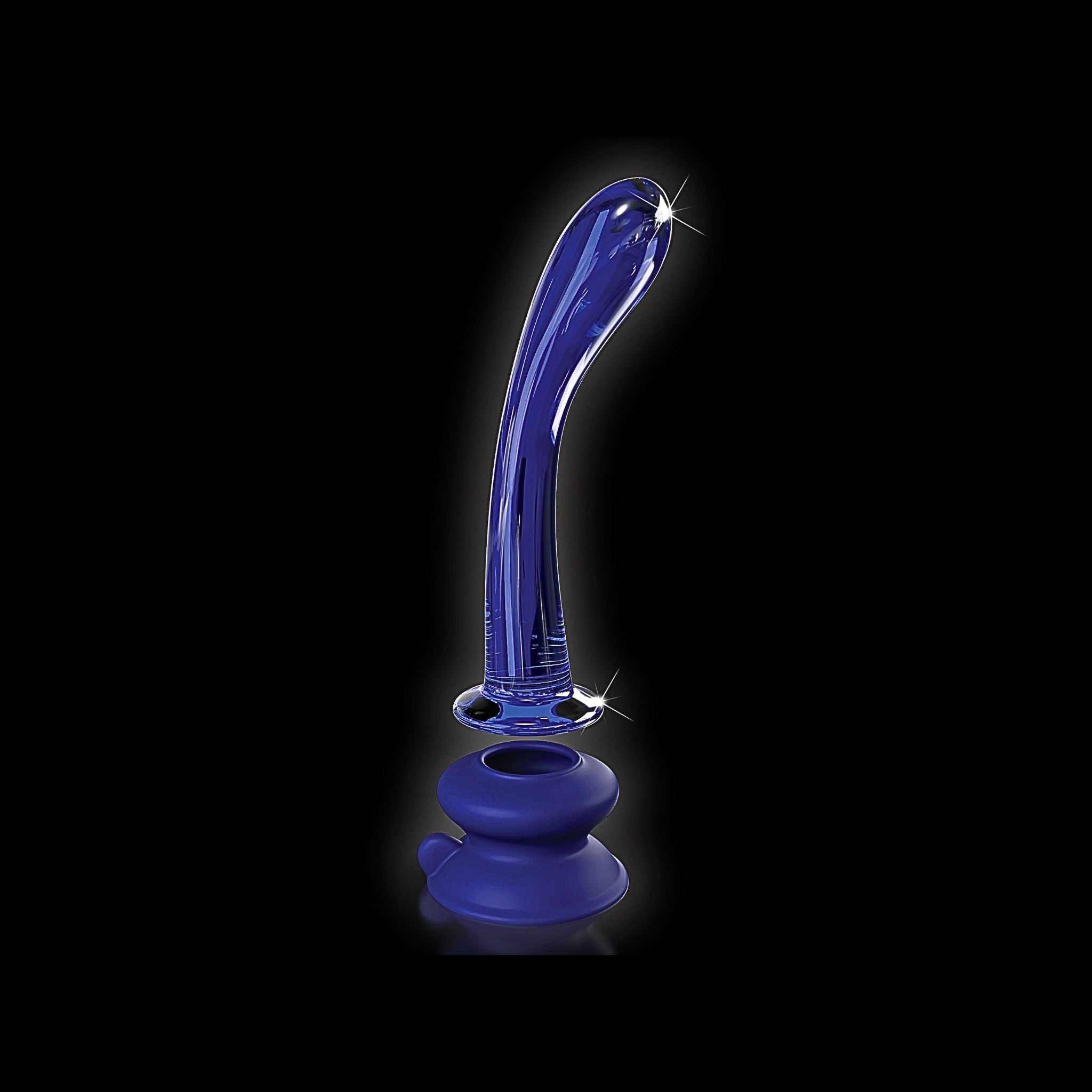 Harness-compatible glass wand hovering above its silicone mounting base for independent use.