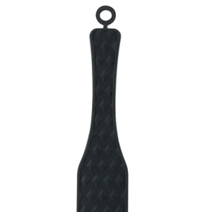 Matte black silicone sensory paddle with storage loop and ease of use handle.