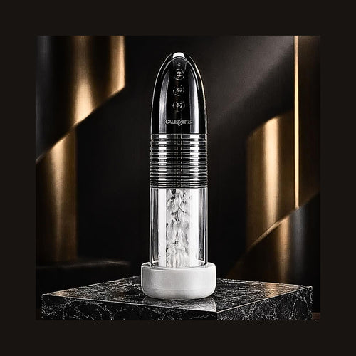 Motorized adaptive intimacy smart pump in clear and black on a marble plinth for PRM.