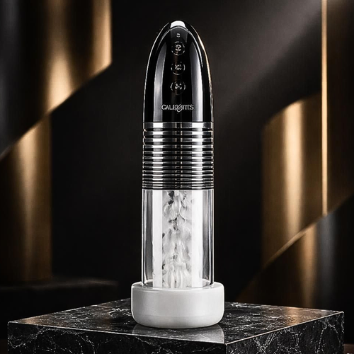 Motorized adaptive intimacy smart pump in clear and black on a marble plinth for PRM.