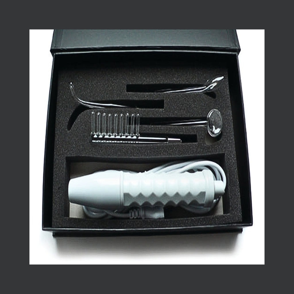 Neon Pulse Wellness Kit for targeted pulse therapy. Wand and four attachments with red neon for Joint-friendly electro-stimulation
