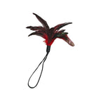 Red pleasure feather for predictable tactile feedback and gentle sensory wellness.