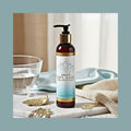 Sliquid Balance Splash Unscented on marble. Gentle, pH-balanced intimate wash pump bottle, 8.5 fl. oz.