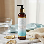 Sliquid Balance Splash Unscented on marble with gold leaf accents. Gentle, pH-balanced intimate wash pump bottle, 8.5 fl. oz.