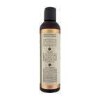 Sliquid unscented massage oil ingredient panel lists vegan, plant-based extracts.