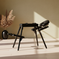 Somatic integration bench side profile offering structural relief and ergonomic wellness.